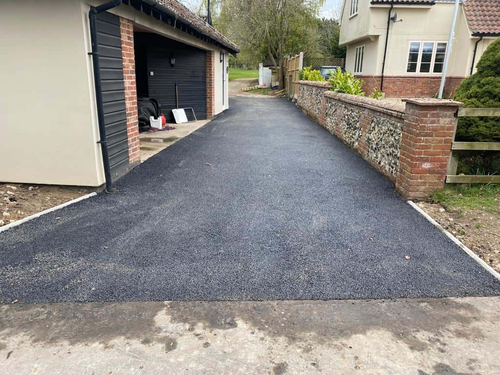 This is a newly installed tarmac driveway. All works carried out by NS Driveways Camberley