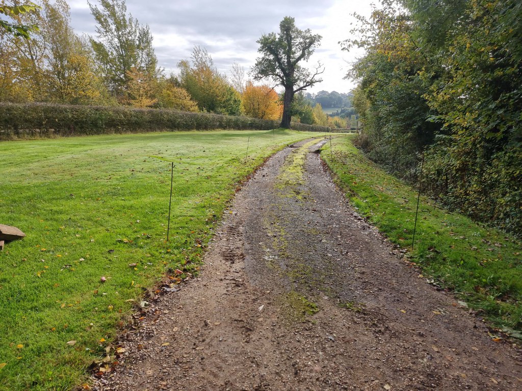 This is a large driveway which is just about to have a tar and chip driveway installed on by NS Driveways Camberley