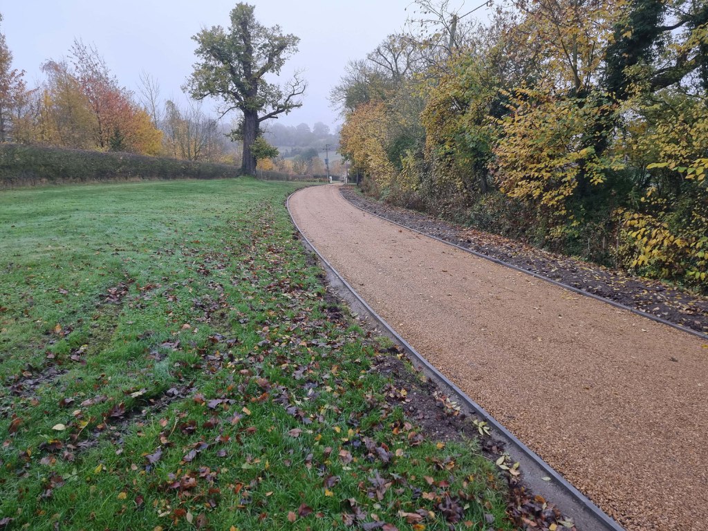 This is a large driveway which has just had a tar and chip driveway installed on by NS Driveways Camberley