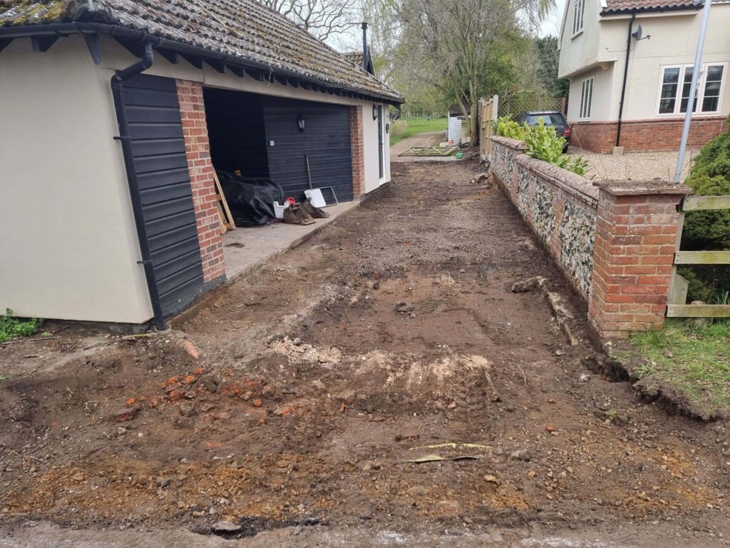 This is a tarmac driveway that is in the process of being dug out and installed by NS Driveways Camberley